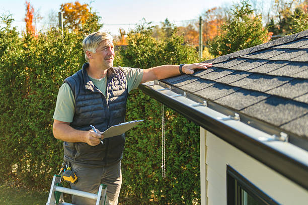Professional Roof Replacement technician working in Bronson, IA